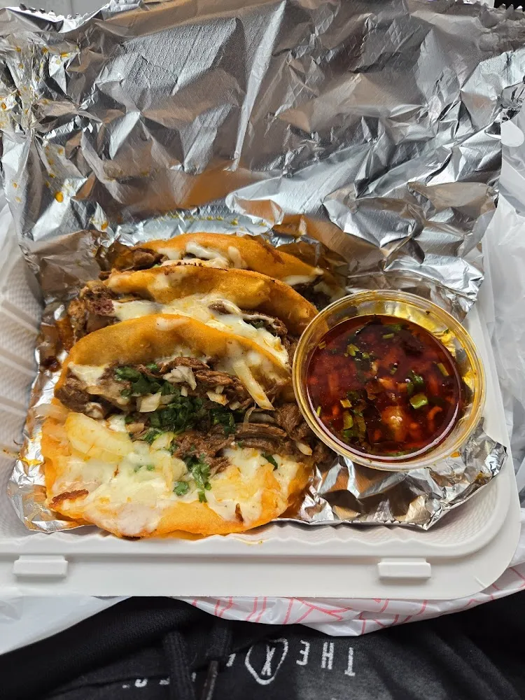 Steak Birria Tacos and Consume'